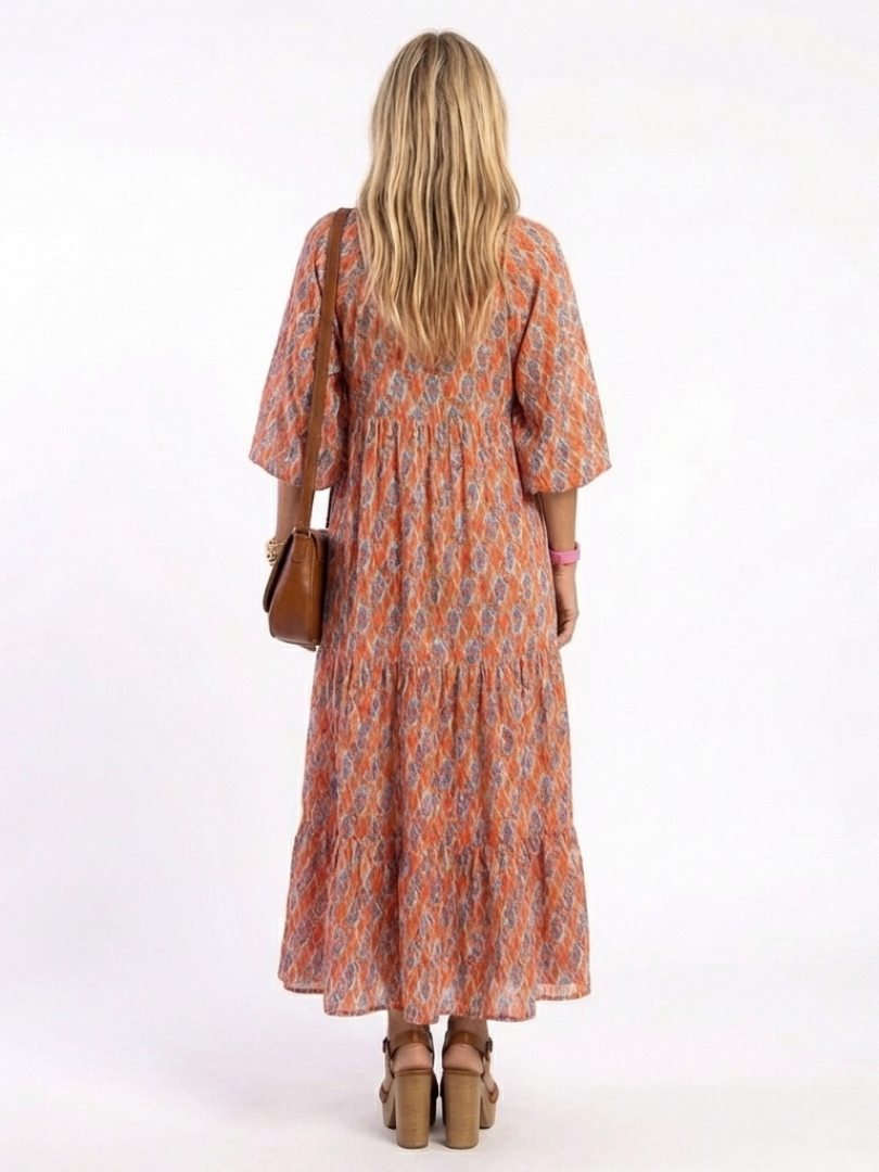Amara | Geometric Print V-Neck Layered Midi Dress
